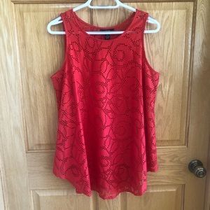 Eyelet overshirt with a cami underneath.